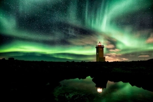 Lighthouse And Aurora-Filled Sky, Iceland Copyright: Gunnar Gestur
